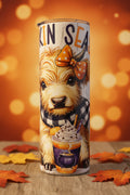 Pumpkin Season Highland Cow 20 oz skinny tumbler with orange bow, buffalo plaid scarf and pumpkin spice drink