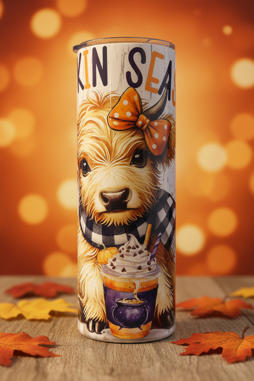 Pumpkin Season Highland Cow 20 oz skinny tumbler with orange bow, buffalo plaid scarf and pumpkin spice drink
