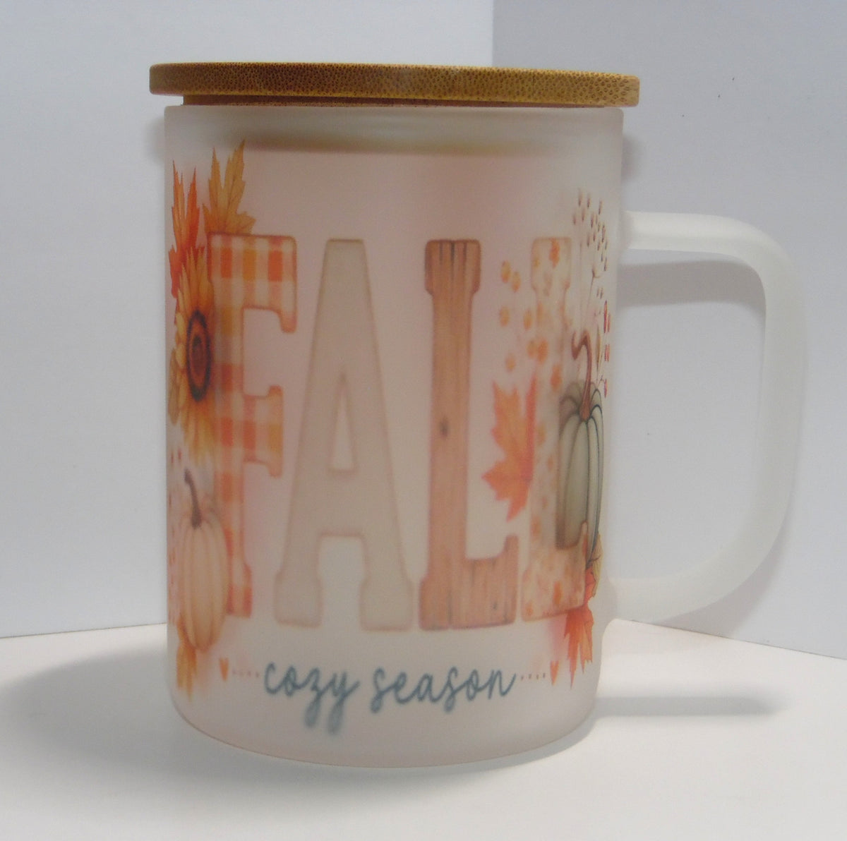 Original photo of Fall Cozy Season mug with patterned lettering and pumpkins