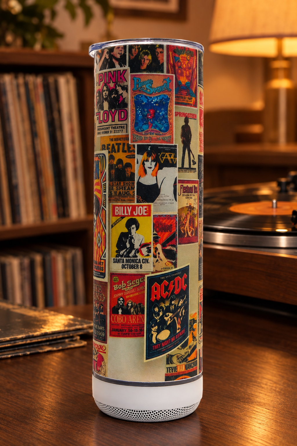 Concert collage tumbler with Bluetooth speaker in a record-room setting