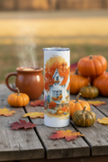 Autumn Cottage 20 oz skinny tumbler with watercolor white cottage, pumpkins, picket fence, and colorful fall foliage