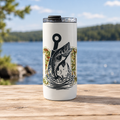 Jumping fish and camouflage cup in a lakeside tabletop setting
